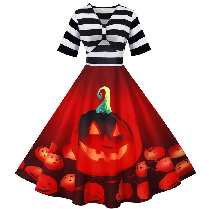 "Retro damklänning med pumpamotiv i mjukt tyg, midi-längd, perfekt för Halloween-fester och höstfiranden."