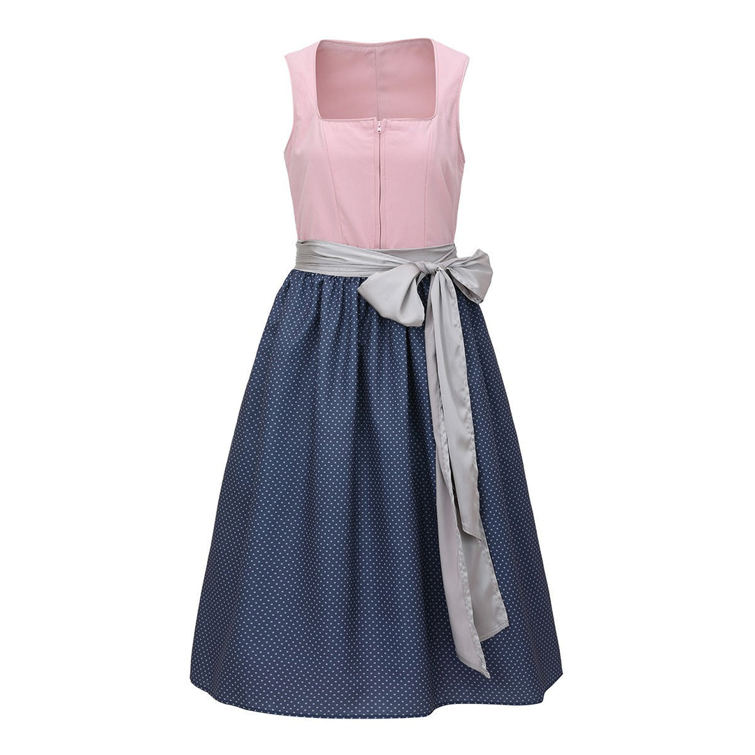 "Rosa vintage Dirndl klänning med klassiska detaljer för festliga tillfällen, perfekt för Oktoberfest och temafester."