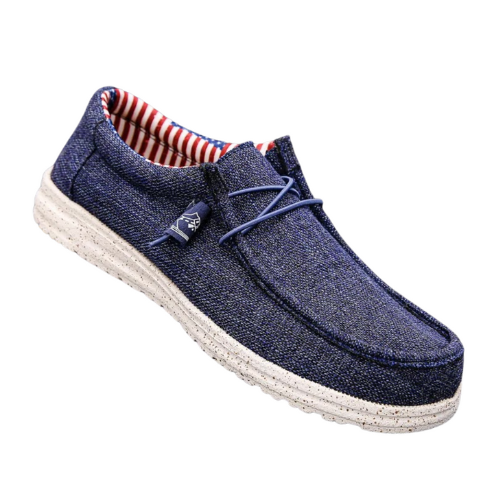 Slip-on herrskor i canvas, stilrena och bekväma loafers med halkfri sula och andandes material, perfekta för vardagen.