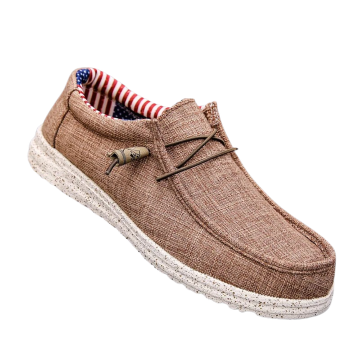 Slip-on herrskor i canvas, stilrena och bekväma loafers med halkfri sula och andandes material, perfekta för vardagen.