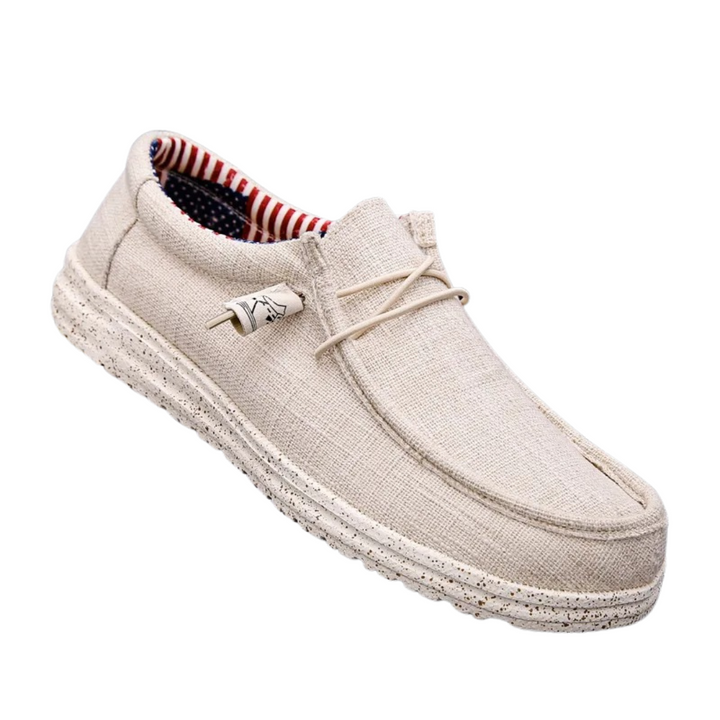 Slip-on herrskor i canvas, stilrena och bekväma loafers med halkfri sula och andandes material, perfekta för vardagen.