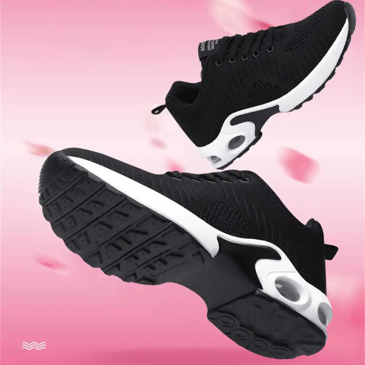 "Snygga dam sneakers med hålfotsstöd och luftkuddar, gråa och vita, perfekt för komfort och aktiv livsstil."