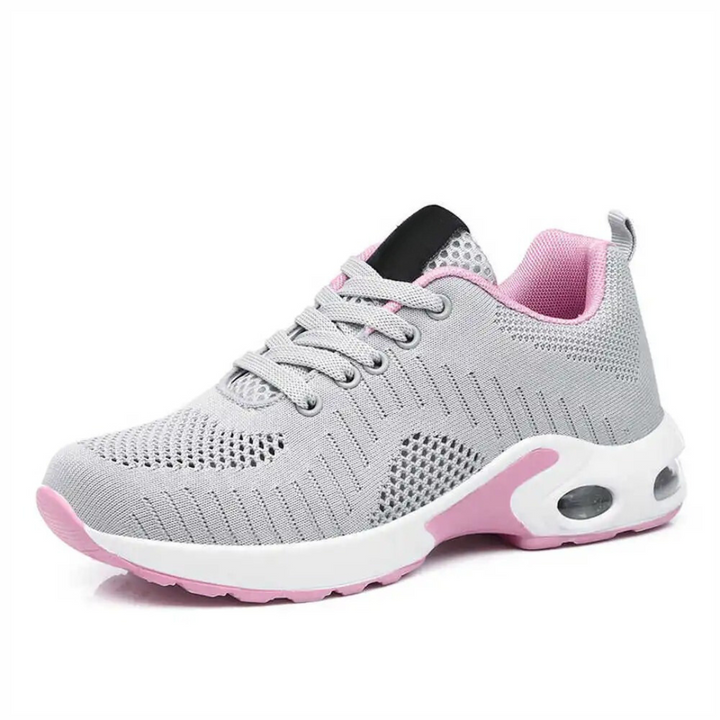 "Snygga dam sneakers med hålfotsstöd och luftkuddar, gråa och vita, perfekt för komfort och aktiv livsstil."