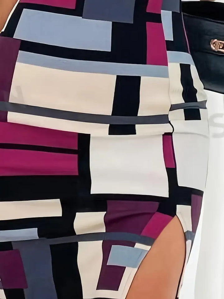 "Sommarklänning i polyester med trendig färgblockdesign, figursydd passform, perfekt för sommar och festliga tillfällen."