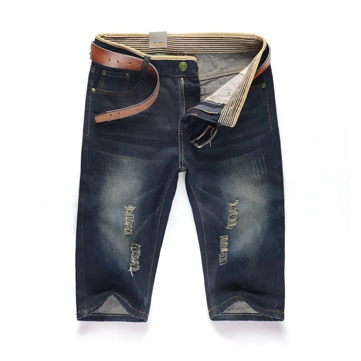 "Somriga tvättbara jeansshorts med perforeringar för män, knälånga och lös passform med funktionella fickor."