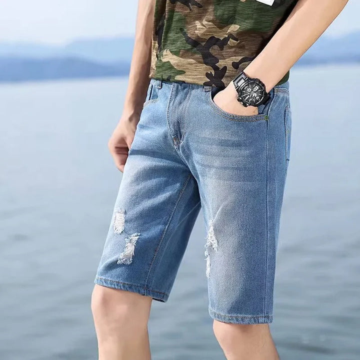 "Somriga tvättbara jeansshorts med perforeringar för män, knälånga och lös passform med funktionella fickor."