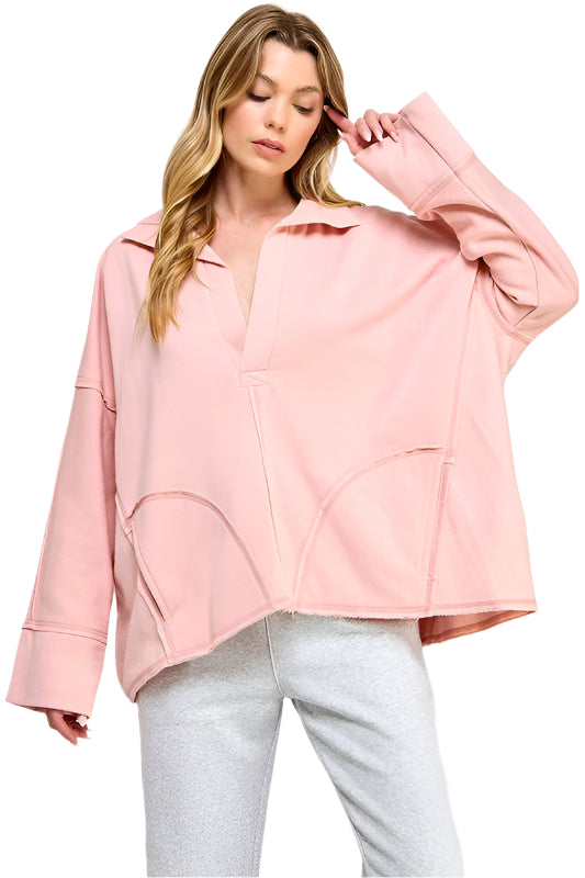"Stickad V-ringad damtröja med dolmanärmar i mjuk textil för elegant och avslappnad stil"