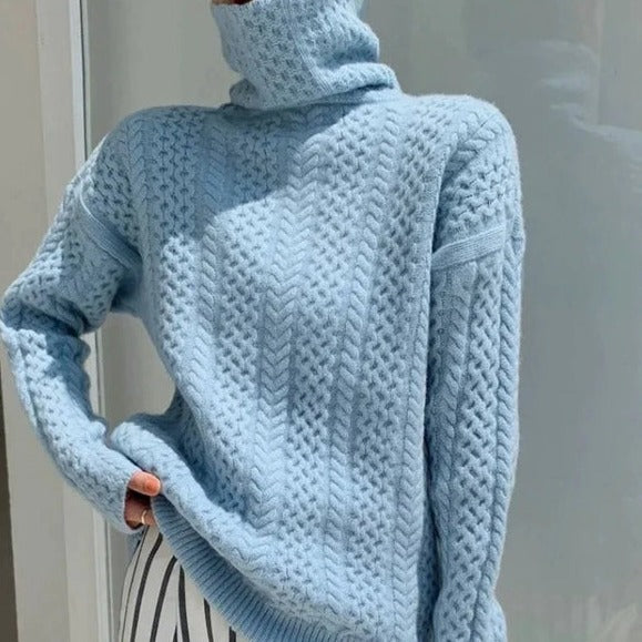 "Stickad damtröja i kashmir med rullekrage, lyxig och varm för kalla dagar, elegant design, olika färger tillgängliga."