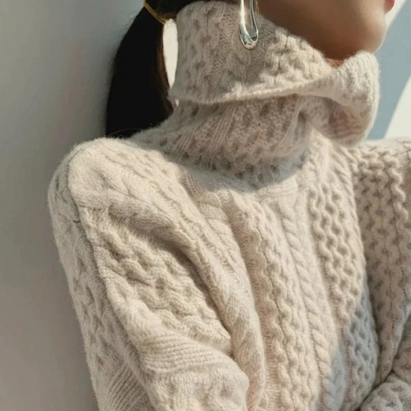 "Stickad damtröja i kashmir med rullekrage, lyxig och varm för kalla dagar, elegant design, olika färger tillgängliga."