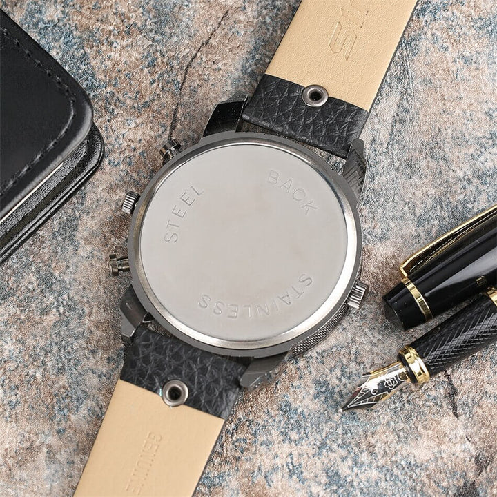 "Stilfull damklocka i rostfritt stål med läderarmband, elegant och tidlös design, perfekt accessoar för alla tillfällen."