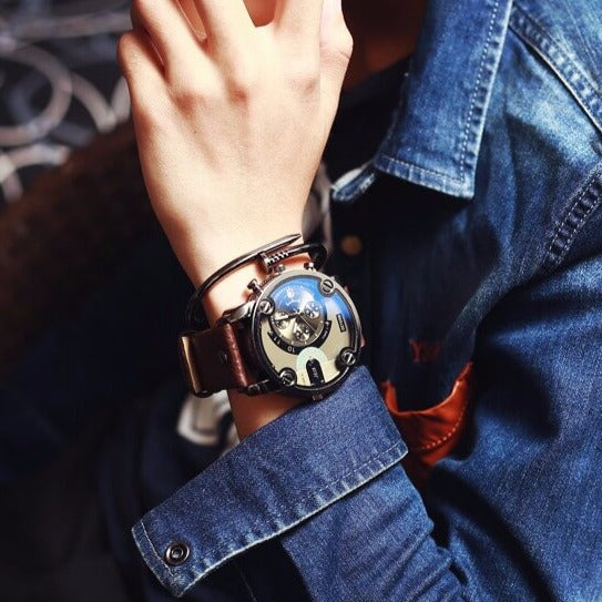 "Stilfull damklocka i rostfritt stål med läderarmband, elegant och tidlös design, perfekt accessoar för alla tillfällen."