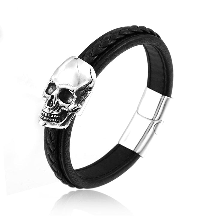 "Stiligt läderarmband för män med detaljerad skalle i rostfritt stål, elegant och tuff design."