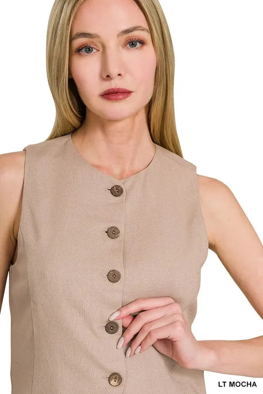 "Stilren dam dunväst i linne-stil, knäppt design med fickor, lätt material perfekt för alla säsonger."