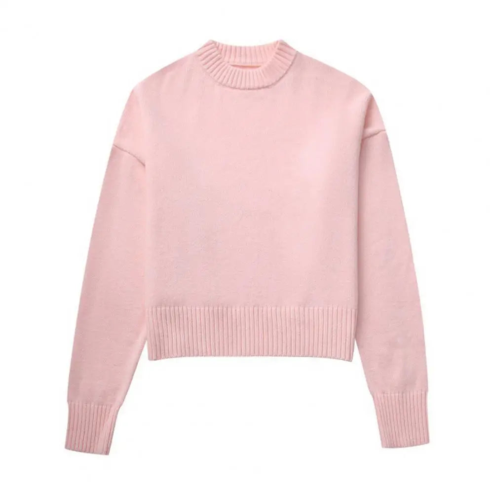 "Stilren dam pullover, ribbstickad med sidslitsar, smickrande silhuett. Perfekt för vardag och fest."
