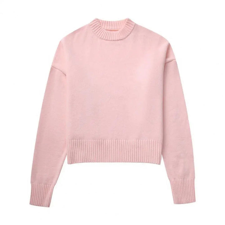 "Stilren dam pullover, ribbstickad med sidslitsar, smickrande silhuett. Perfekt för vardag och fest."