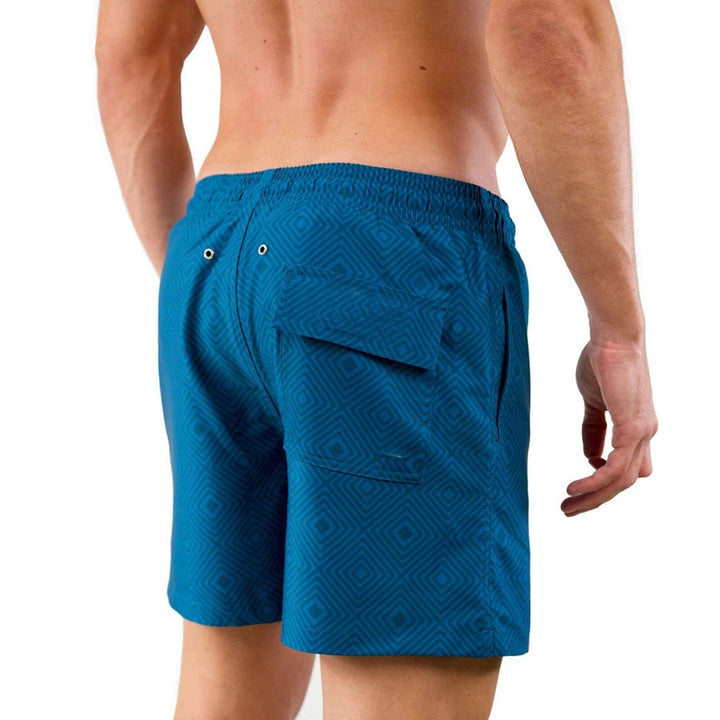 "Stilrena herr strandshorts med kompressionsfoder, sidofickor och snabb torkande tyg, perfekta för strand och träning."