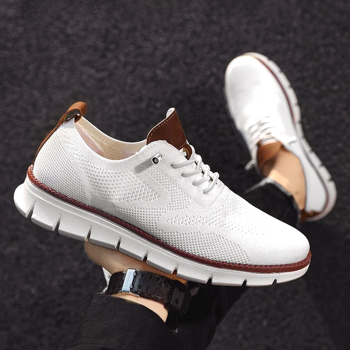 "Stilrena herr urban sneakers i syntetiskt material, svarta, med andningsbar design för maximal komfort och hållbarhet."