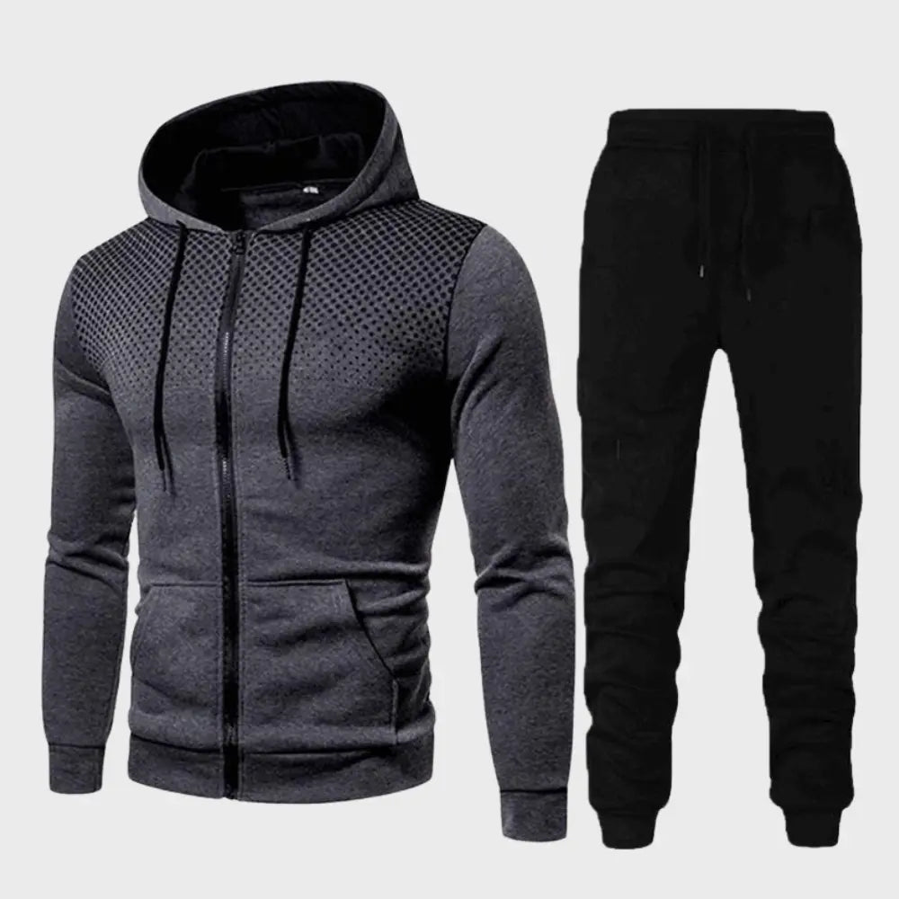 "Stilrent herrträningsset med hoodie och joggingbyxor, modern passform, mjukt material i trendiga färger."