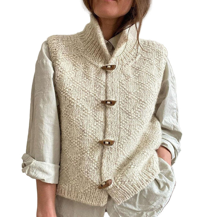 "Stilsäker damväst i modernt design, ärmlös och kort med mjuk textur, perfekt för olika outfits och tillfällen."
