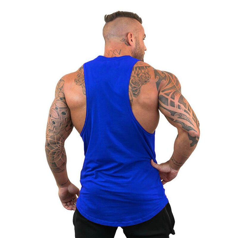 "Svart Beast Mode linne för gym, ärmlös med Y-formad rygg, framhäver muskulös fysik, perfekt för träning och avslappning."