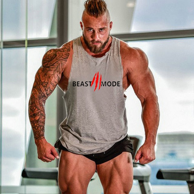 "Svart Beast Mode linne för gym, ärmlös med Y-formad rygg, framhäver muskulös fysik, perfekt för träning och avslappning."
