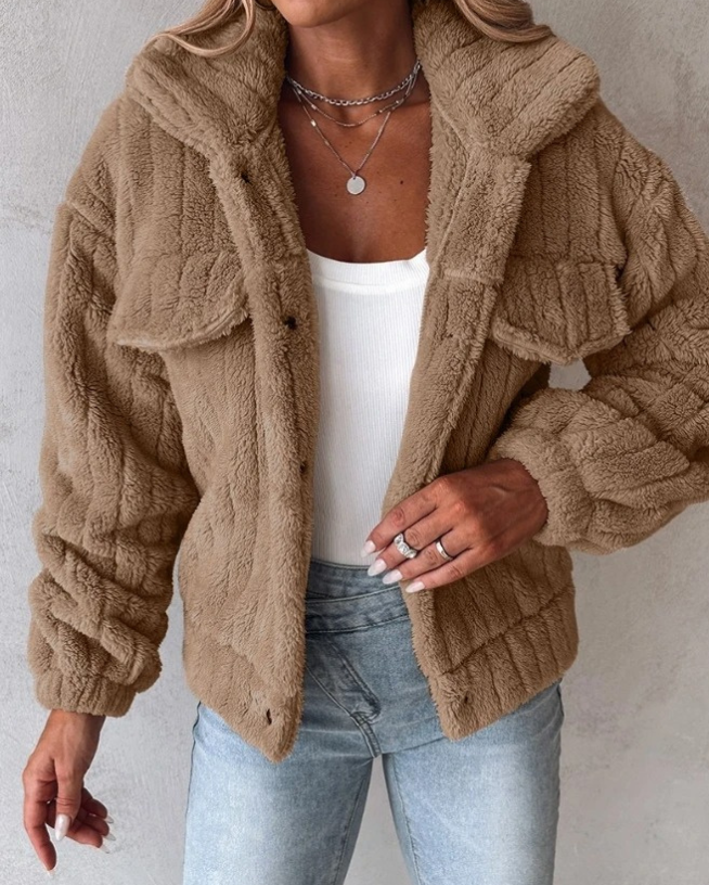 "Svart lång teddyjacka för damer, chic stil, mjuk textur, elegant avslappnad passform för alla säsonger."