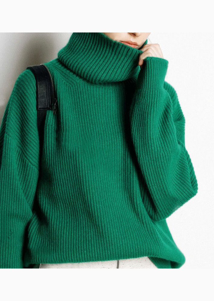 "Tidlös dam turtleneck tröja i mjuk stickad design, elegant loose fit för komfort och värme under kyliga dagar."
