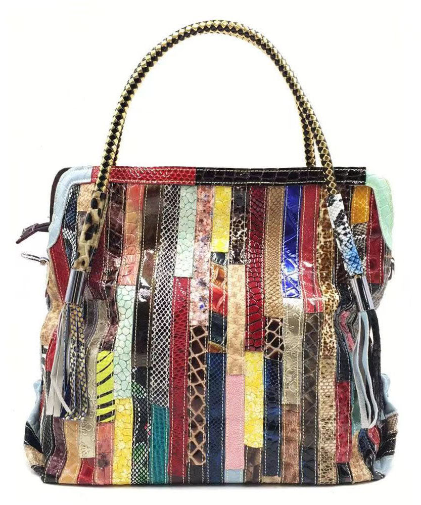 "Tote handväska för damer med ormmönstrad patchwork; stilsäker design med dragkedja, rymligt inre och unikt mönster."