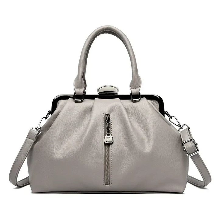 "Trendig dam crossbody väska av PU-läder i beige med justerbar axelrem, elegant design och praktisk storlek."