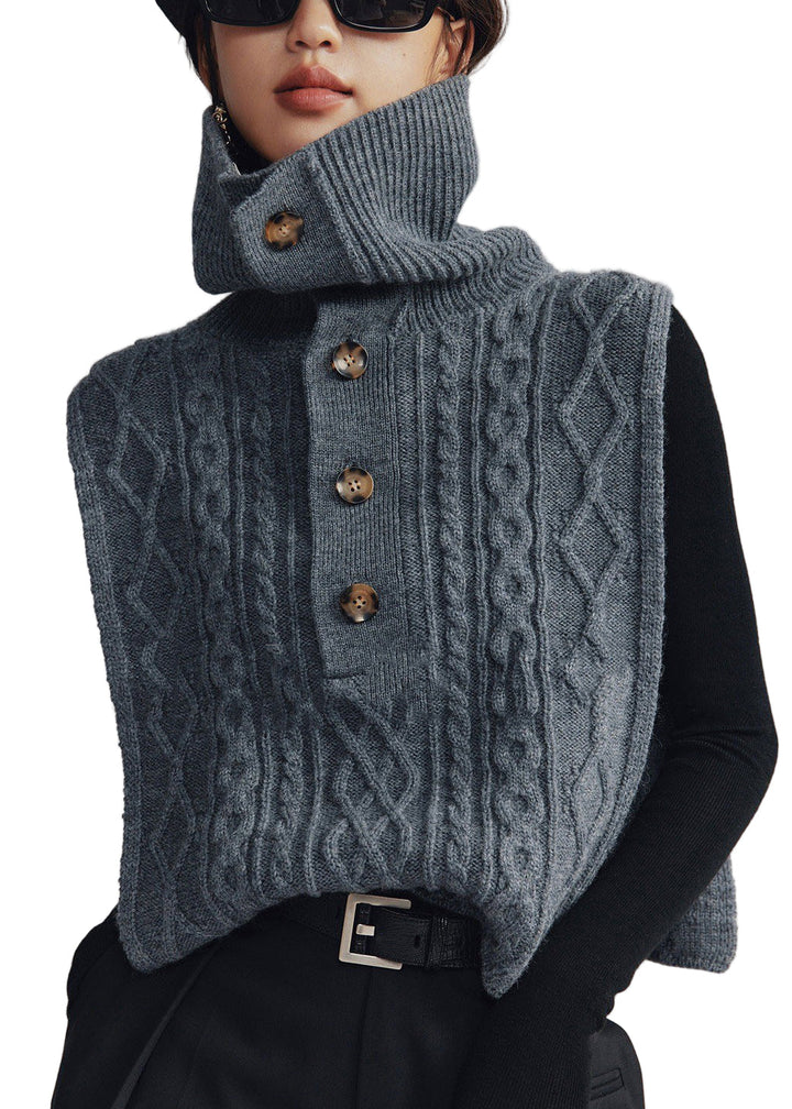 Turtleneck kabelstickad damväst i mörkgrå, varm loose fit. Elegant, kabelmönster, idealisk för lager-på-lager stil.