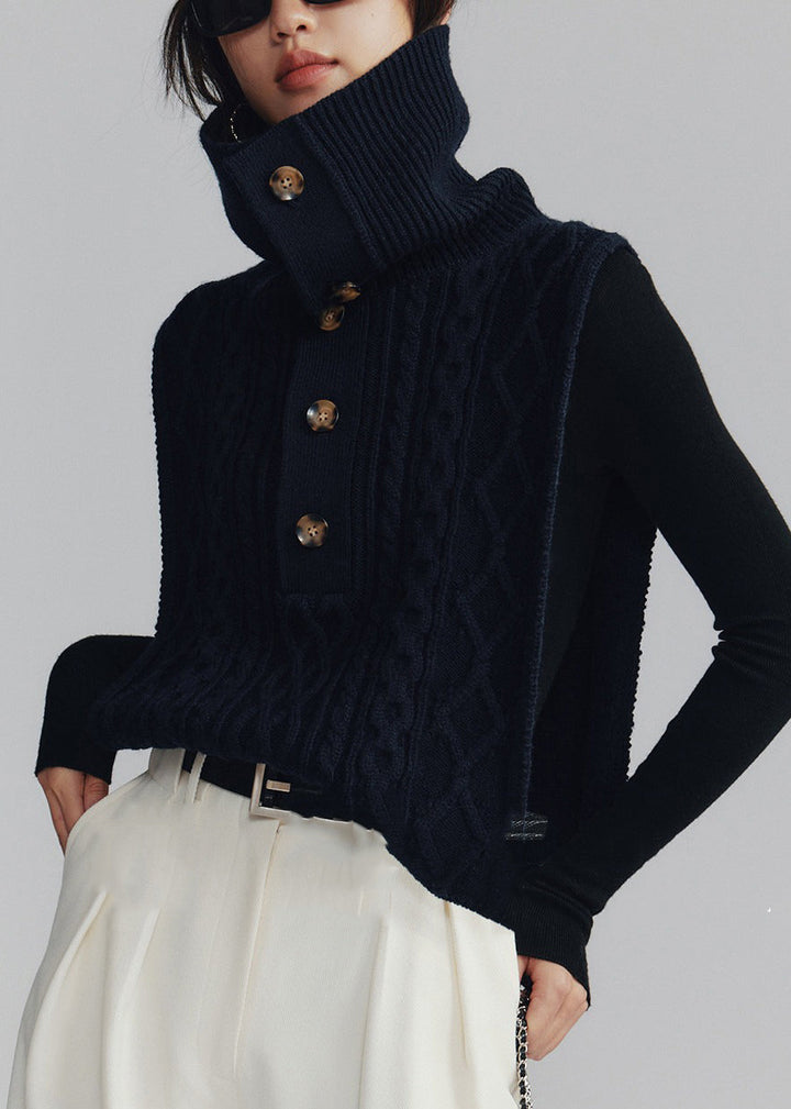 Turtleneck kabelstickad damväst i mörkgrå, varm loose fit. Elegant, kabelmönster, idealisk för lager-på-lager stil.