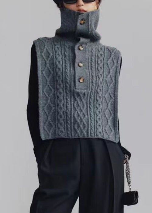 Turtleneck kabelstickad damväst i mörkgrå, varm loose fit. Elegant, kabelmönster, idealisk för lager-på-lager stil.