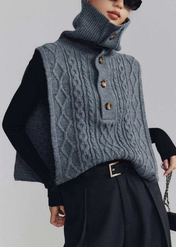 Turtleneck kabelstickad damväst i mörkgrå, varm loose fit. Elegant, kabelmönster, idealisk för lager-på-lager stil.