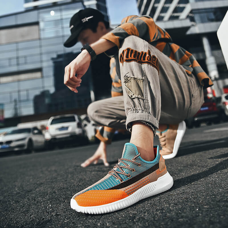 "Ultralätta, bekväma sneakers för herrar och damer, sida vy, andningsbar mesh med vadderad innersula för optimal komfort"