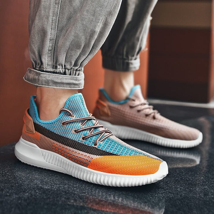 "Ultralätta, bekväma sneakers för herrar och damer, sida vy, andningsbar mesh med vadderad innersula för optimal komfort"