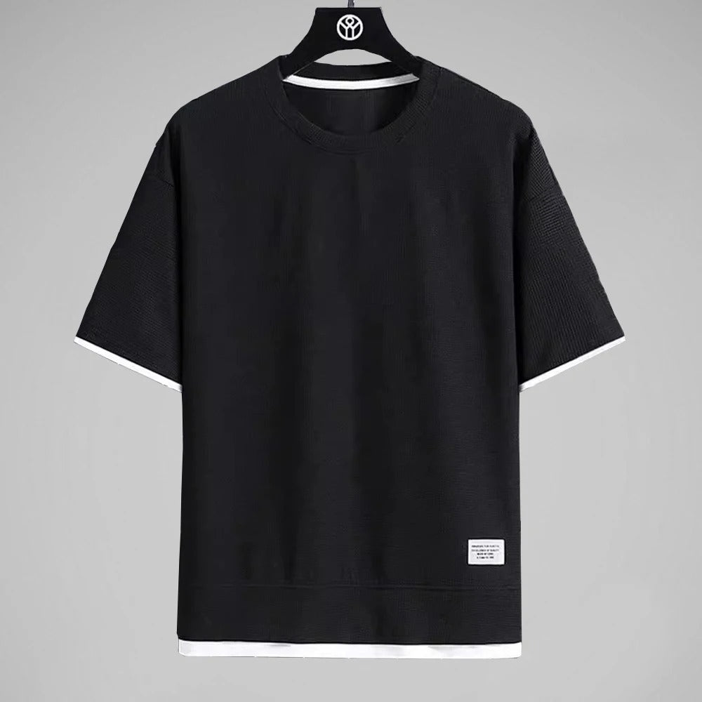 "Ultramjuk herr våffel-T-shirt i premiumkvalitet med kort ärm och ventilerande struktur, stilfull och bekväm look."