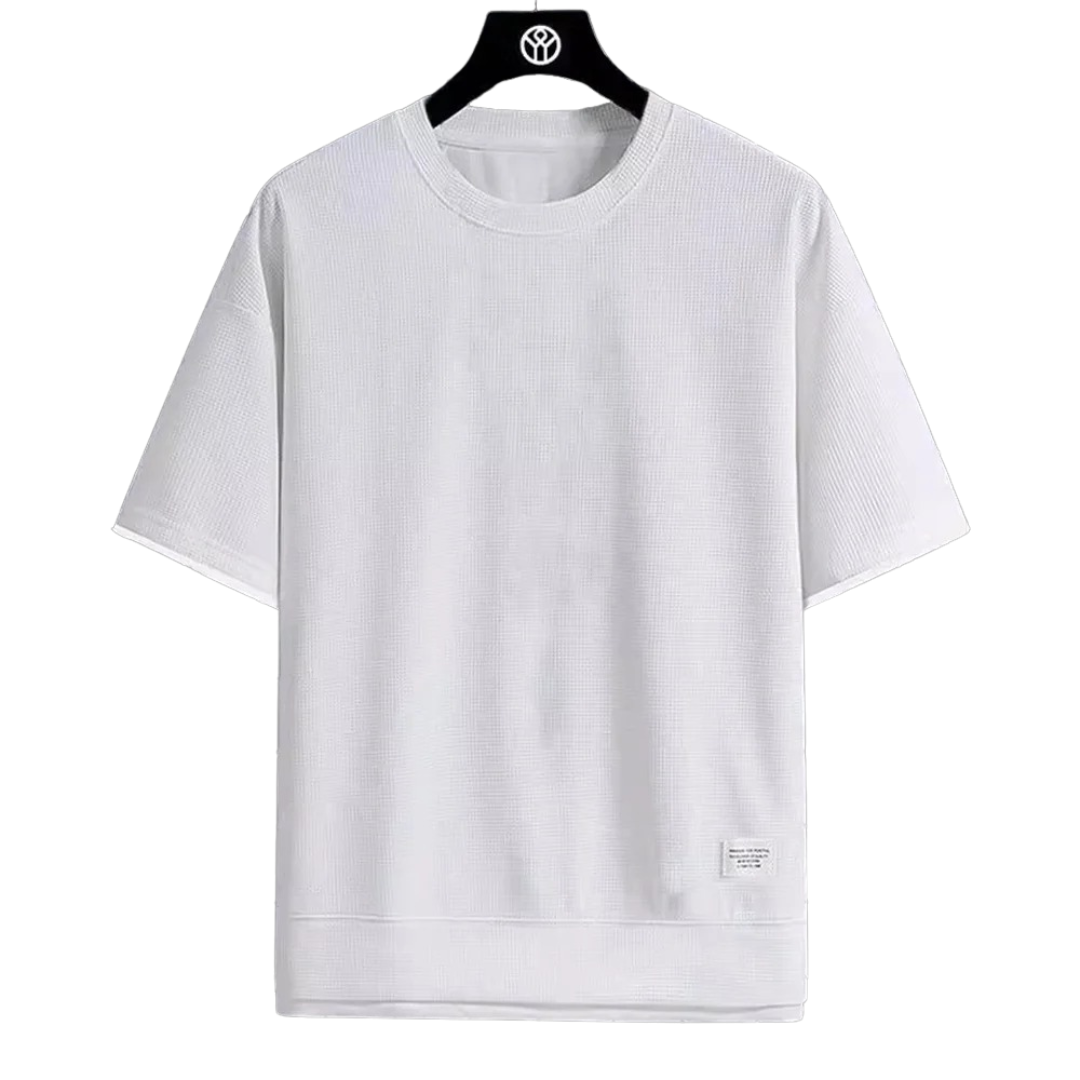 "Ultramjuk herr våffel-T-shirt i premiumkvalitet med kort ärm och ventilerande struktur, stilfull och bekväm look."