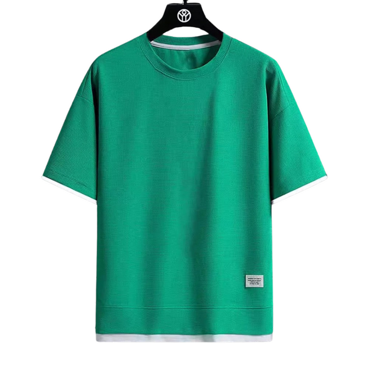 "Ultramjuk herr våffel-T-shirt i premiumkvalitet med kort ärm och ventilerande struktur, stilfull och bekväm look."