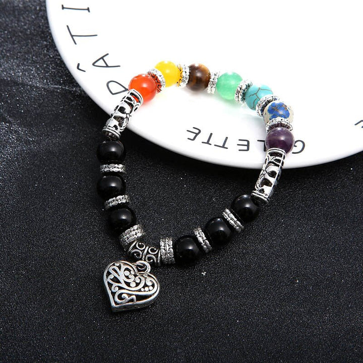Unisex 7 Chakra armband med naturliga halvädelstenar, färgstarka stenar som ametist, lapis lazuli och turkos för balans.
