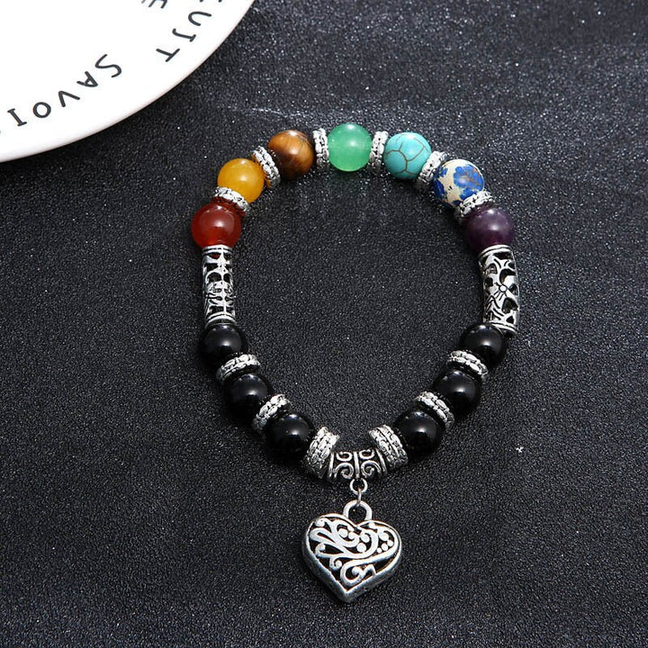 Unisex 7 Chakra armband med naturliga halvädelstenar, färgstarka stenar som ametist, lapis lazuli och turkos för balans.