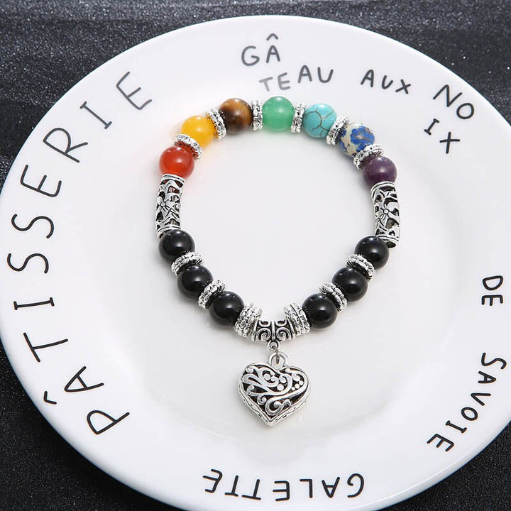 Unisex 7 Chakra armband med naturliga halvädelstenar, färgstarka stenar som ametist, lapis lazuli och turkos för balans.