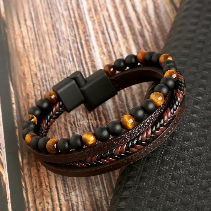 "Unisex armband set i flätat konstläder med pärlband, elegant accessoar i svart och brunt för alla tillfällen."