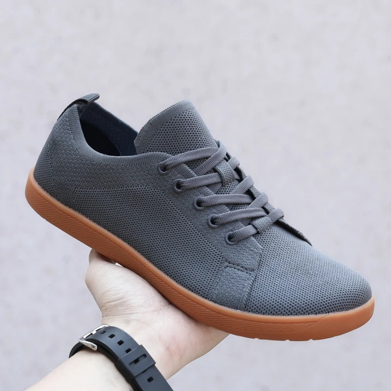 Unisex barfotaskor med bred tåbox och andningsbar mesh, minimalistisk design, idealisk för träning och vardag.