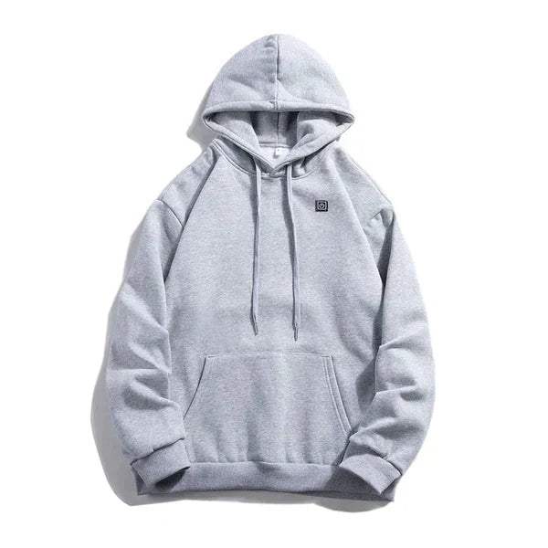 Unisex hoodie med justerbar värmefunktion och fickor, svart design, syntetisk material för komfort och stil i kyligt väder.