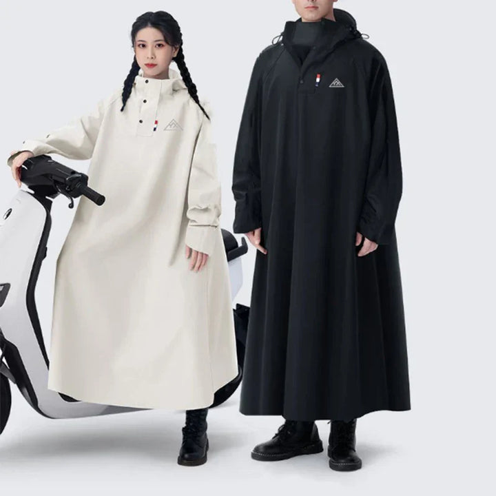 Unisex lång regnponcho i vattentätt Oxford-tyg, khaki färg, med huva.