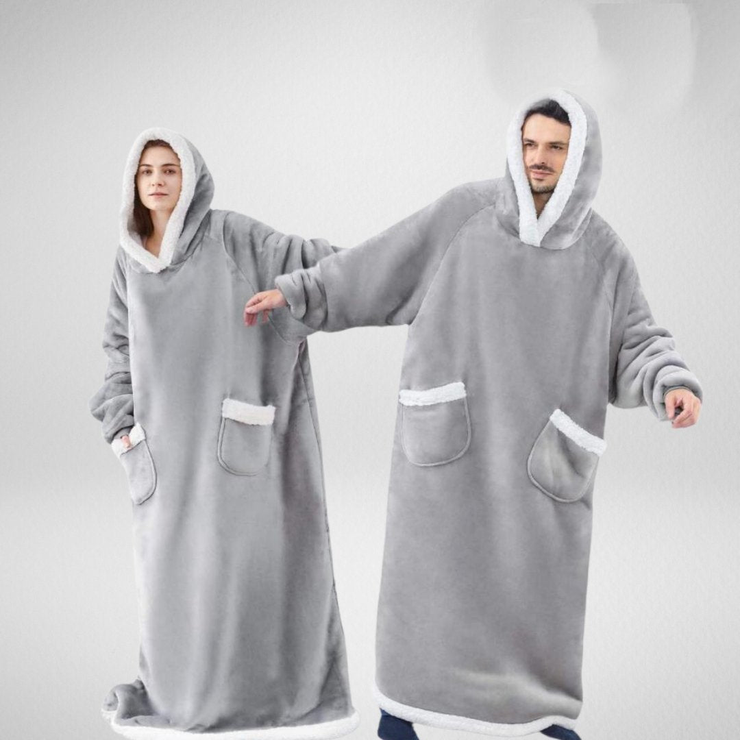 Unisex oversize filt med huva av microfleece sherpa, mjukt material och värmande foder, perfekt för komfort.
