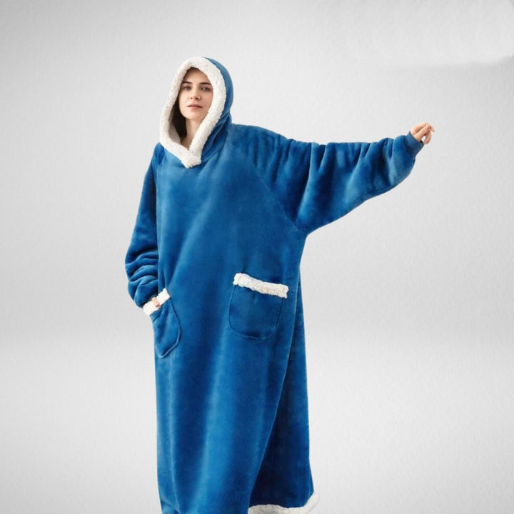 Unisex oversize filt med huva av microfleece sherpa, mjukt material och värmande foder, perfekt för komfort.