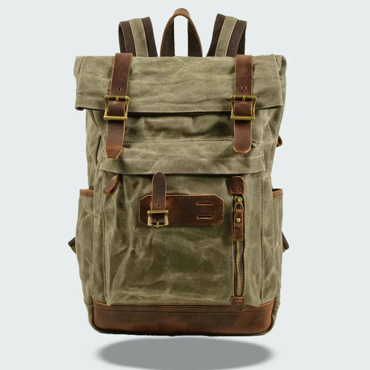 "Unisex vikbar vintage ryggsäck i vaxad canvas, stilren och funktionell, med vadderade axelremmar och flera fickor."