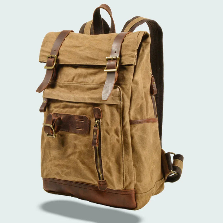 "Unisex vikbar vintage ryggsäck i vaxad canvas, stilren och funktionell, med vadderade axelremmar och flera fickor."