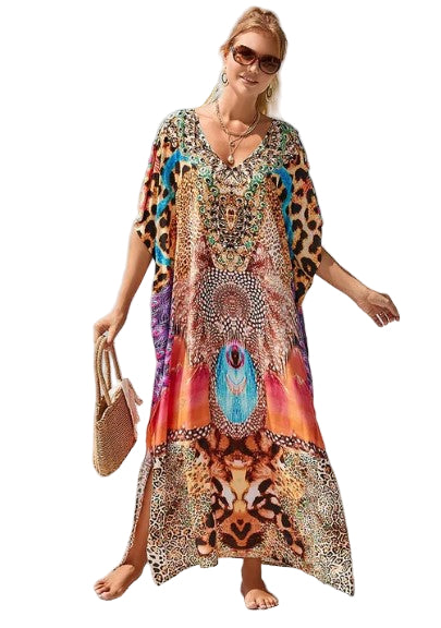 "Vackra boho långklänning med livfullt regnbågstryck, mjukt draperande passform, perfekt för stil och komfort."